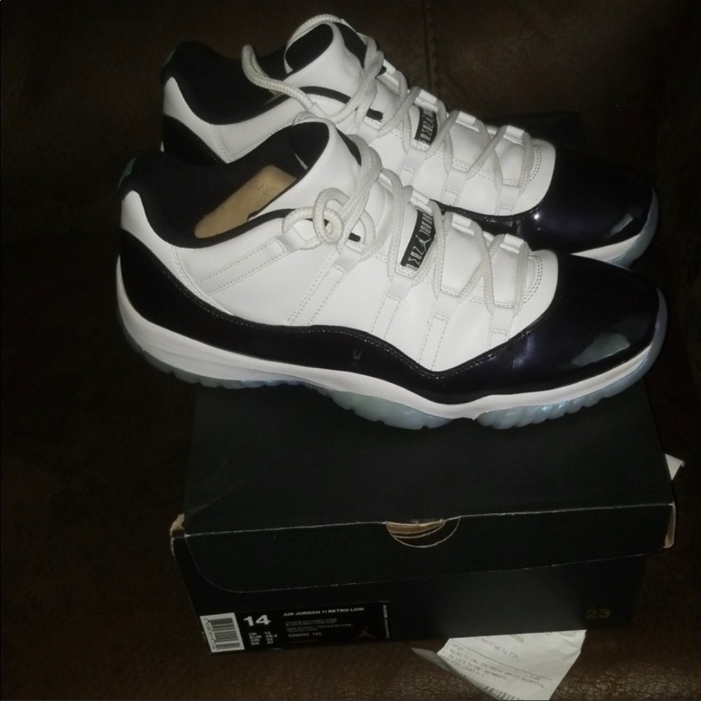 Jordan 11 low emerald Green shoes.